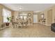 Inviting living and dining area with abundant natural light, comfortable seating, and an open layout at 3086 Brenton Manor Loop, Winter Haven, FL 33881