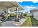 Beautiful covered patio with fan, offering a great space to relax and enjoy the outdoors at 3086 Brenton Manor Loop, Winter Haven, FL 33881