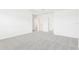 Bright bedroom with neutral walls and carpet, ready for personalization and relaxation at 3213 Viceroy Ct, Poinciana, FL 34759