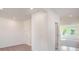 Hallway with neutral colored walls and carpeting leads to adjoining rooms at 3222 Viceroy Ct, Kissimmee, FL 34759