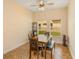Charming dining area with tile flooring, a wood table and seating for six at 3783 Moon Dancer Pl, St Cloud, FL 34772