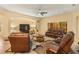 Expansive living room featuring comfortable seating, a neutral color palette, and plenty of natural light at 3783 Moon Dancer Pl, St Cloud, FL 34772