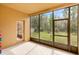 Screened-in patio offering a serene outdoor space with views of the backyard and surrounding greenery at 3783 Moon Dancer Pl, St Cloud, FL 34772