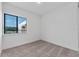 A well-lit bedroom with a window showing ample natural light at 38 W Harding St # C, Orlando, FL 32806