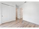 Bright, empty bedroom with hardwood floors, closet space, and lots of natural light at 38 W Harding St # C, Orlando, FL 32806