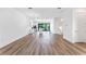 Open floorplan with wood floors and recessed lighting at 38 W Harding St # C, Orlando, FL 32806