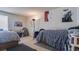 Bedroom with two twin beds and assorted decorations and posters on the walls at 4161 Versailles Dr # 4161G, Orlando, FL 32808