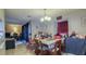 Inviting dining room featuring warm lighting, ideal for enjoying meals at 4161 Versailles Dr # 4161G, Orlando, FL 32808