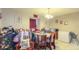 Cozy dining room with a table set for meals, creating a warm atmosphere at 4161 Versailles Dr # 4161G, Orlando, FL 32808