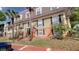 Charming multi-level condo with a cozy entrance and well kept lawn at 4161 Versailles Dr # 4161G, Orlando, FL 32808