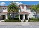 Charming townhome with a tile roof and well-maintained landscaping. Enjoy the Florida lifestyle! at 4895 Clock Tower Dr, Kissimmee, FL 34746