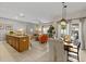 Bright, open-concept living space with a kitchen, living room, and dining area, perfect for entertaining at 4895 Clock Tower Dr, Kissimmee, FL 34746