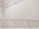 Bright walk-in closet offering lots of shelving for optimal organization and storage solutions at 5252 Hidden Cypress Ln, Oviedo, FL 32765
