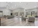 Bright and airy living area with an open layout, featuring a fireplace, seating area, and access to the outdoor pool at 5337 Foxshire Ct, Orlando, FL 32819