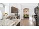 Kitchen with granite countertops, stainless appliances and eat-in breakfast nook visible through an archway at 534 Paloma Dr, Davenport, FL 33837