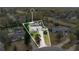 A beautiful aerial view of a secluded property, highlighted by its spacious layout and natural surroundings at 5410 S Pine Hill Cir, Orlando, FL 32808