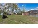 This property features a large backyard and a shed at 5410 S Pine Hill Cir, Orlando, FL 32808