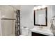 Bathroom with a shower, tiled walls, and vanity with a dark wood cabinet at 5410 S Pine Hill Cir, Orlando, FL 32808