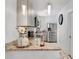 Modern kitchen featuring stainless steel appliances and stylish granite countertops at 5410 S Pine Hill Cir, Orlando, FL 32808