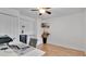 Bright room featuring an office setup with wood floors and modern fixtures at 5410 S Pine Hill Cir, Orlando, FL 32808