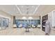 Relax in this beautifully decorated lobby with comfortable seating, stylish decor, and abundant natural light at 5640 Nevis Ter, Kissimmee, FL 34758