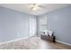 Empty bedroom with wood-look floors and a bi-fold closet at 7507 Pacific Heights Cir, Orlando, FL 32835