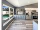 This kitchen overlooks the pool and has updated appliances and two-tone cabinets to make a modern design at 8603 Primrose Dr, Kissimmee, FL 34747