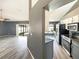 Open-concept living room seamlessly connects to the kitchen, creating a harmonious flow for entertaining at 8603 Primrose Dr, Kissimmee, FL 34747