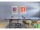 Well-appointed game room featuring ping pong and foosball tables is perfect for leisure activities and gatherings at 9023 Shadow Mountain St, Davenport, FL 33896