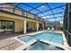 Screened-in pool and patio area with outdoor furniture and open views of the backyard at 9023 Shadow Mountain St, Davenport, FL 33896