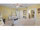 Sun-filled bedroom featuring tile flooring, private bathroom, and plenty of natural light at 111 E Monument Ave # 705, Kissimmee, FL 34741