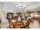 Open concept living space featuring a dining area, living room, and kitchen area at 111 E Monument Ave # 705, Kissimmee, FL 34741