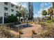 Community fountain and seating area at 1100 Delaney Ave # F409, Orlando, FL 32806