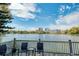 Enjoy a beautiful lake view from the deck at 1100 Delaney Ave # F409, Orlando, FL 32806