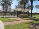 A fenced community pool provides residents a safe and enjoyable place to cool off and socialize at 13413 Zori Ln, Windermere, FL 34786