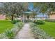 A charming gazebo nestled amidst lush landscaping offers a serene retreat for relaxation at 13413 Zori Ln, Windermere, FL 34786