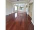 Spacious living room featuring gleaming hardwood floors and modern recessed lighting at 13413 Zori Ln, Windermere, FL 34786
