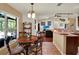 Inviting breakfast nook with a cozy table and chairs, natural light, and backyard views at 14540 Pointe East Trl, Clermont, FL 34711