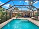 Wonderful screened-in pool and patio area perfect for entertaining or relaxing with Gathering and friends at 14540 Pointe East Trl, Clermont, FL 34711