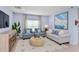 Cozy living room features comfortable seating, natural light, and stylish decor at 146 Jones Fish Camp Rd, Edgewater, FL 32141