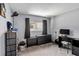 Bedroom featuring neutral walls, closet, and natural light at 1489 Magellan Cir # 603, Orlando, FL 32818
