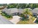Well-maintained one-story home with lush landscaping and attached garage at 1489 Magellan Cir # 603, Orlando, FL 32818