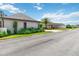 Attractive single-story home with a well-maintained lawn, mature trees, and a spacious driveway at 1489 Magellan Cir # 603, Orlando, FL 32818