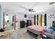 Main bedroom features gray carpet, neutral paint, ceiling fan, and a closet at 1489 Magellan Cir # 603, Orlando, FL 32818