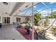 This covered patio features a variety of plants and trees, perfect for enjoying the outdoors at 1489 Magellan Cir # 603, Orlando, FL 32818