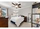 Well-lit bedroom featuring ceiling fan and neutral decor at 1640 Prairie Oaks Dr, St Cloud, FL 34771