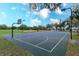 Multiple basketball courts with well-maintained surfaces, lighting, and a backdrop of trees at 1704 Kersley Cir, Lake Mary, FL 32746
