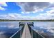 Scenic lake view from a wooden dock, offering a tranquil and picturesque setting at 1704 Kersley Cir, Lake Mary, FL 32746