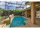 A serene pool area with a screened enclosure and outdoor space perfect for relaxation at 1704 Kersley Cir, Lake Mary, FL 32746
