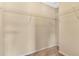 A walk-in closet features wire shelving and neutral carpeting at 1827 Lindzlu St, Winter Garden, FL 34787